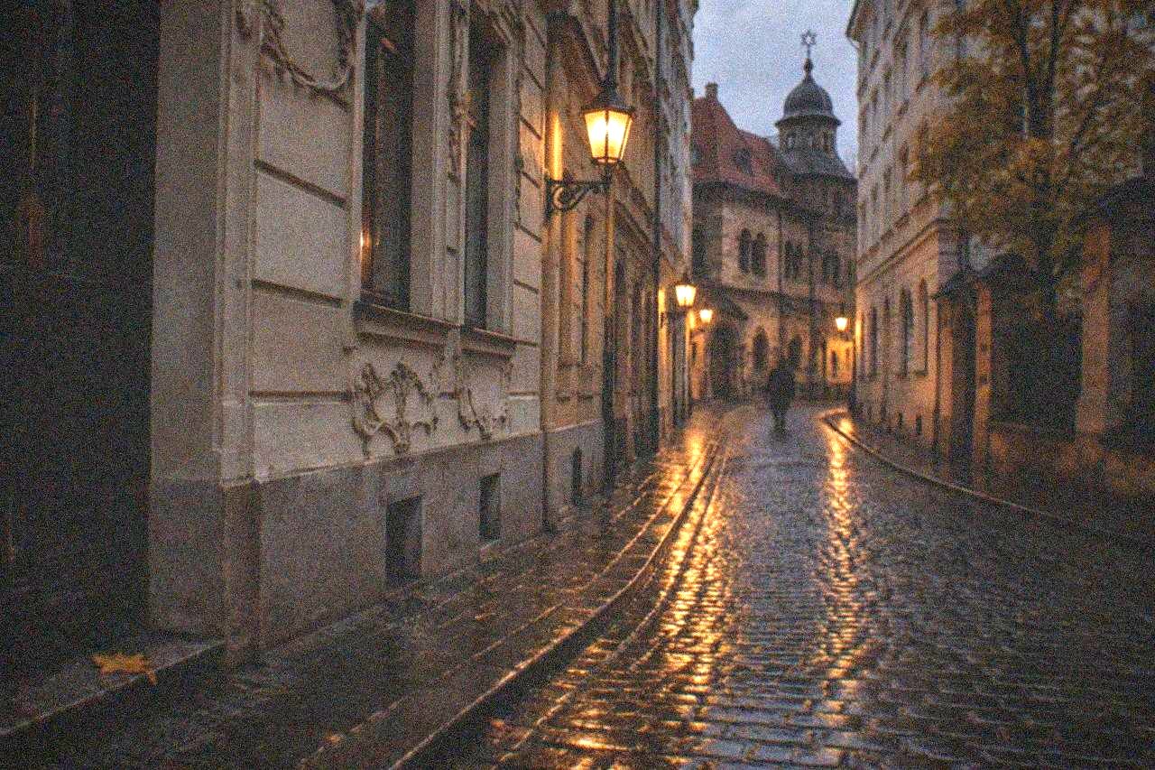 Cobbled street in the Josefov district of Prague with historic building facades