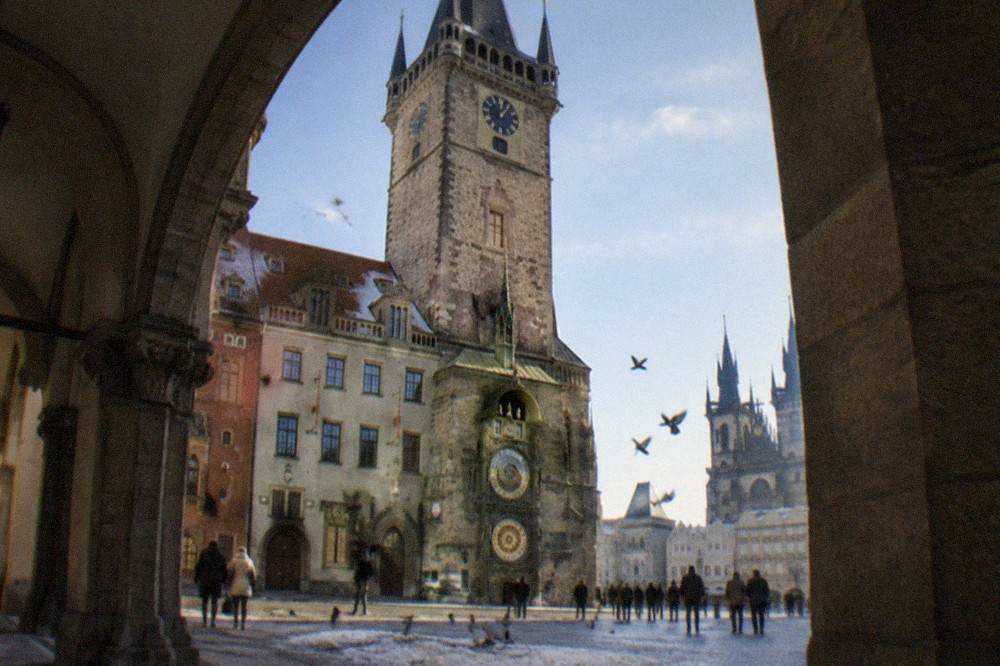 Gothic tower of the Old Town Hall with the Astronomical Clock faces above the square