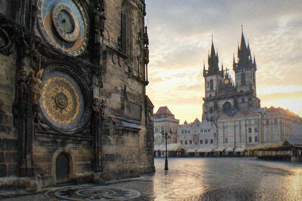 Crowd-free view of the Astronomical Clock dial and calendar face on the Old Town Hall wall