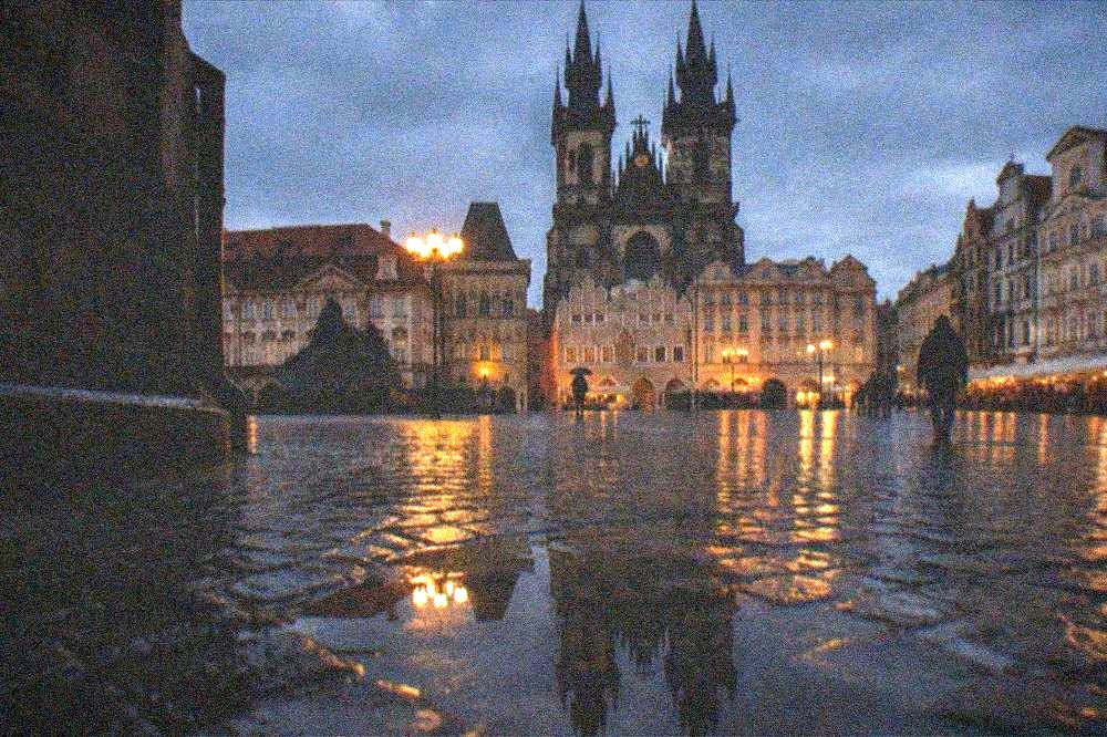 Twin spires of the Tyn Church rising above the roofs on Old Town Square