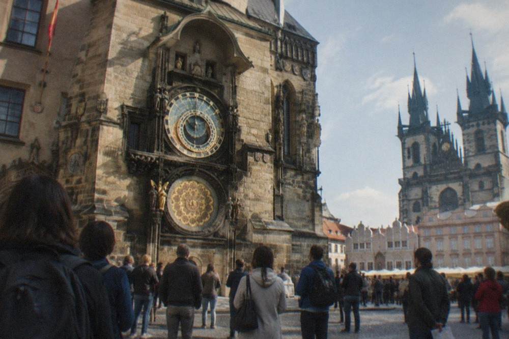 Crowd gathered below the Astronomical Clock on the Old Town Hall watching the hourly apostle show