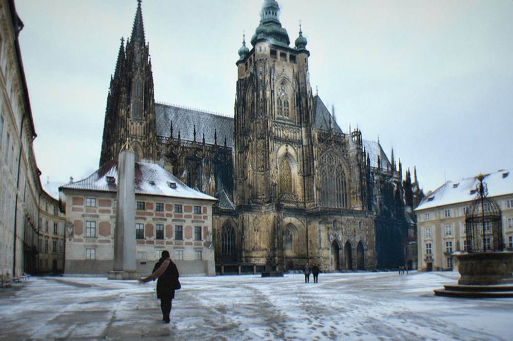 Prague Castle courtyards and St Vitus Cathedral spires under a pale winter sky